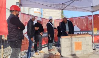 Pose de la première pierre du projet Centenaire de la Sambrienne